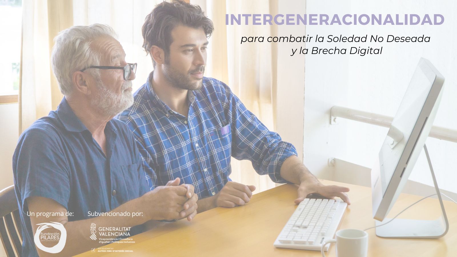 Imagen Programa Intergeneracionalidad Dos personas sentadas frente a un ordenador participando en un programa de intergeneracionalidad para combatir la soledad no deseada y la brecha digital
